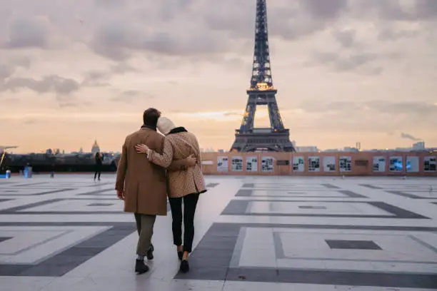 Couple on a getaway overlooking a city
